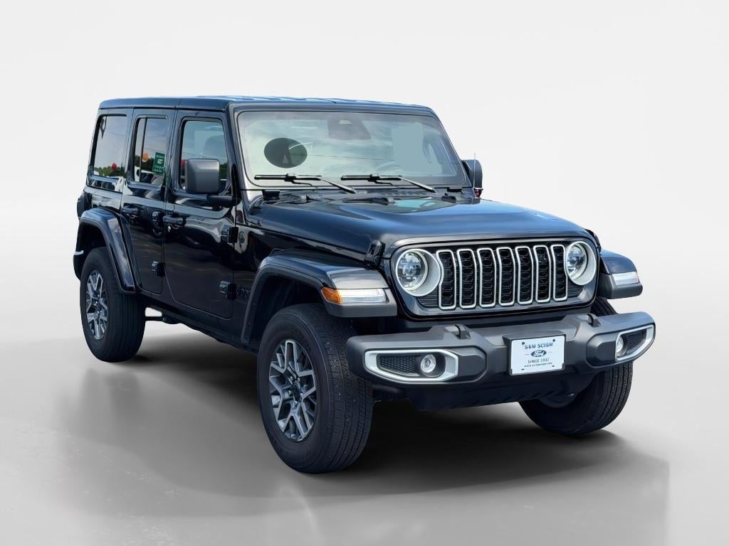 2026 Jeep Wrangler Sahara in Black Clearcoat — front three-quarter view