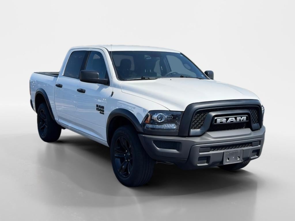 2024 RAM 1500 Classic Warlock in Bright White Clearcoat — front three-quarter view