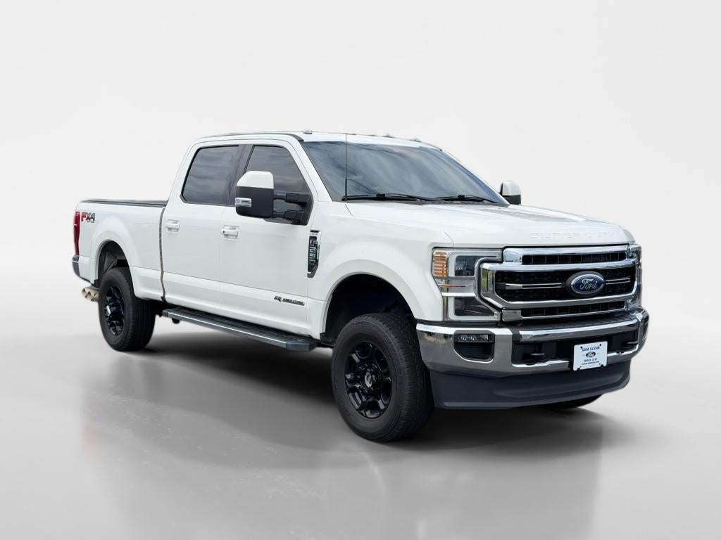 2022 Ford F-250 LARIAT in Star White Metallic Tri-Coat — front three-quarter view