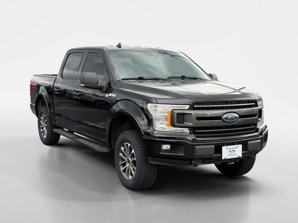2019 Ford F-150 XLT in Agate Black — front three-quarter view