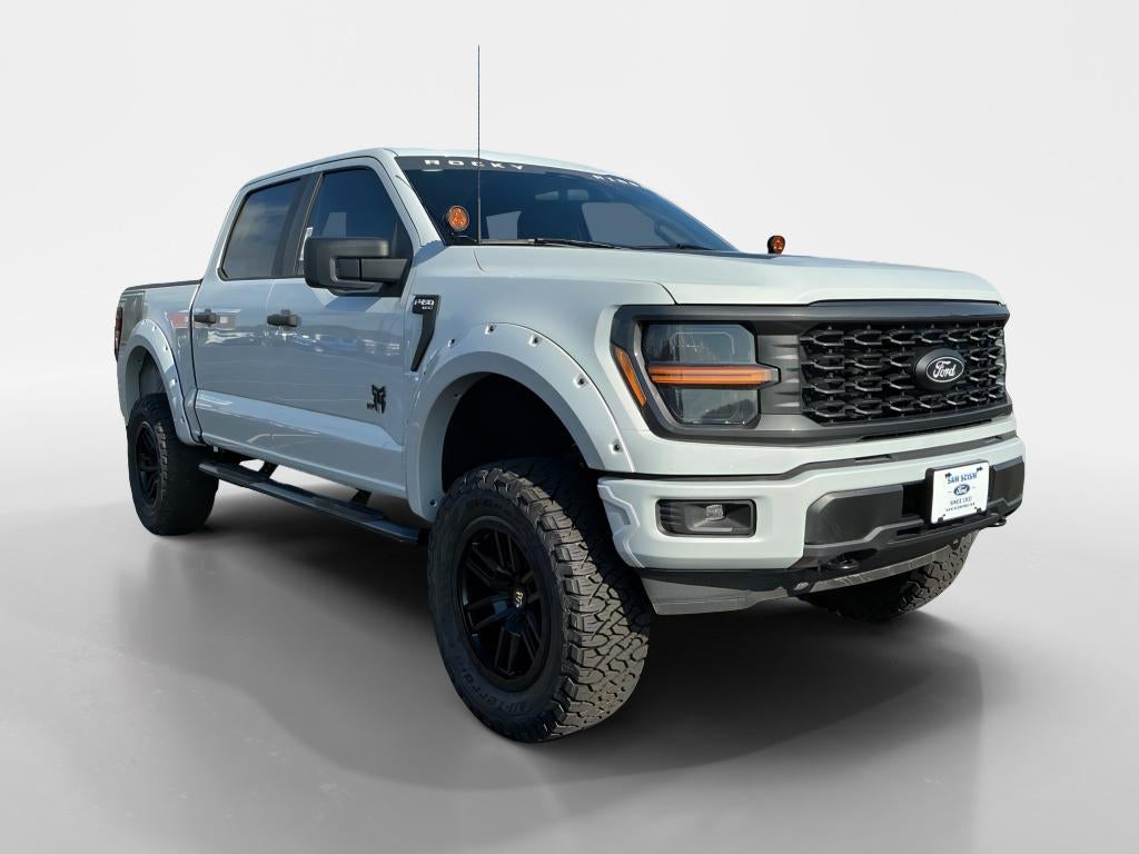 2025 Ford F-150 STX in Space White Metallic — front three-quarter view