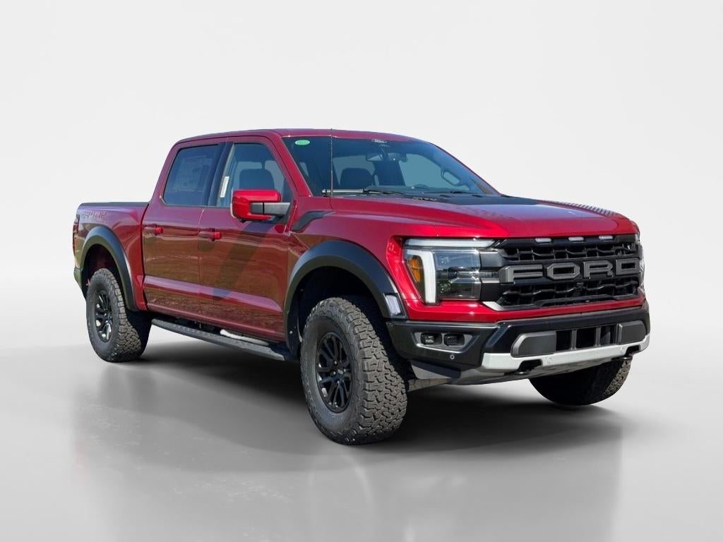 2026 Ford F-150 Raptor in Ruby Red Metallic Tinted Clearcoat — front three-quarter view