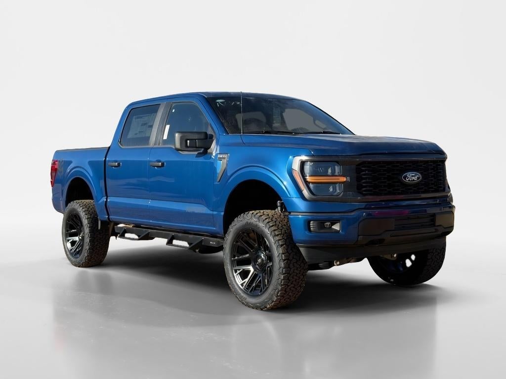 2025 Ford F-150 STX in Atlas Blue Metallic — front three-quarter view