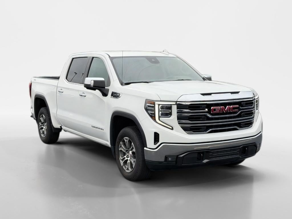 2025 GMC Sierra SLT in Summit White — front three-quarter view