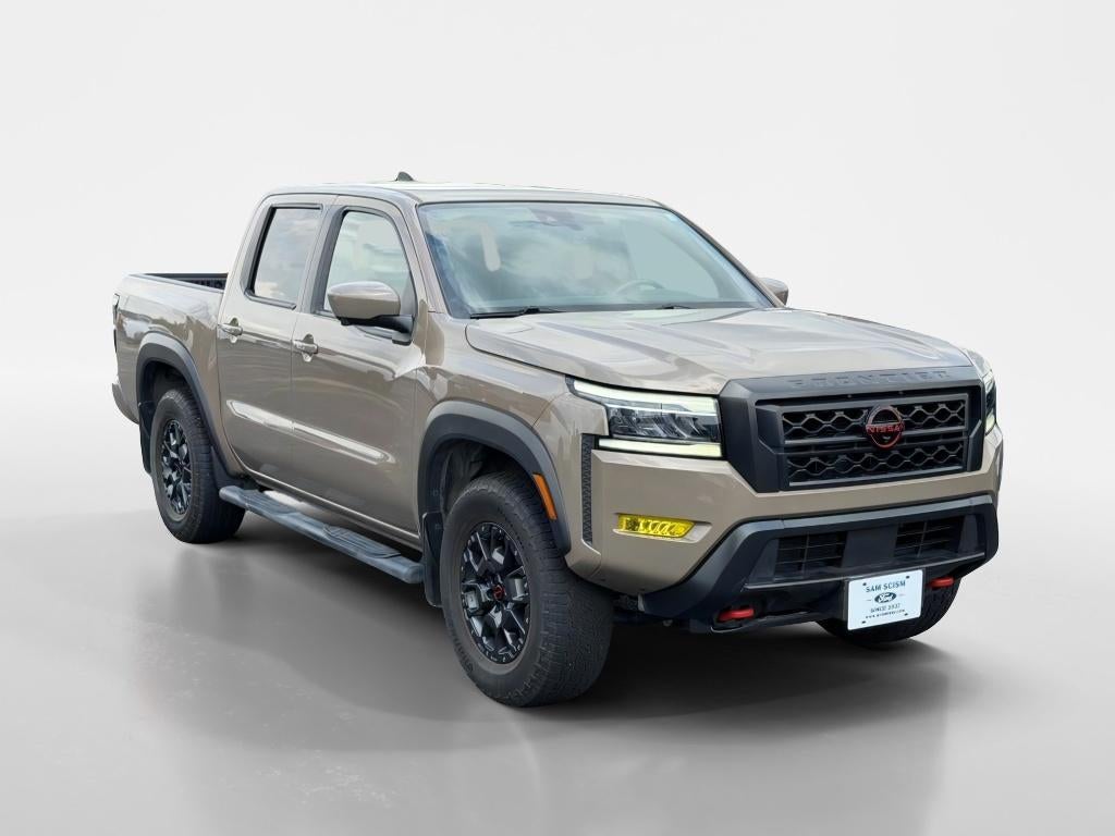 2022 Nissan Frontier PRO-4X in Baja Storm — front three-quarter view