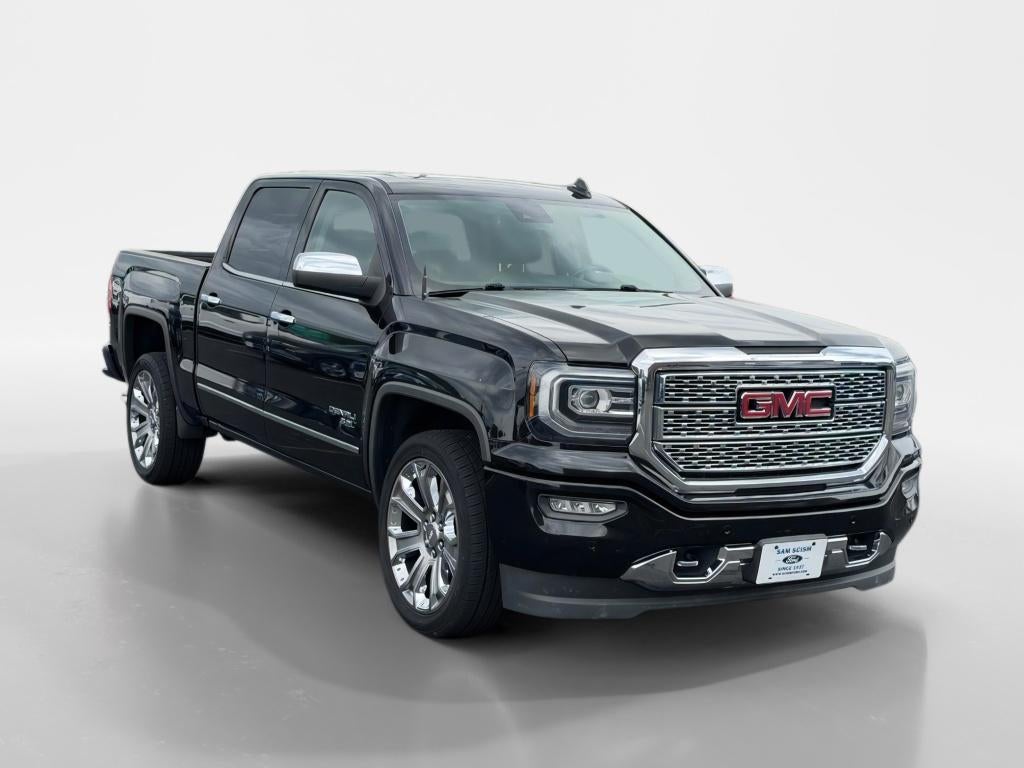 2017 GMC Sierra Denali in Onyx Black — front three-quarter view