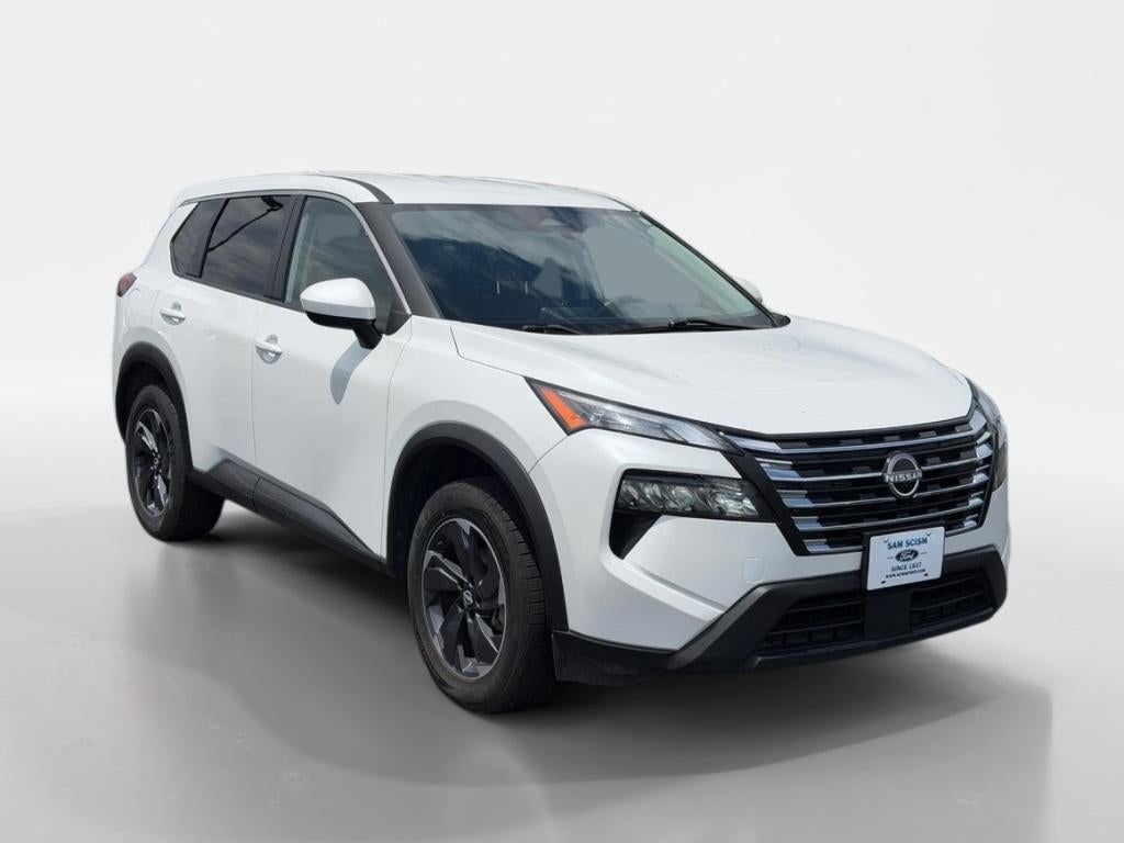 2024 Nissan Rogue SV in Everest White Pearl — front three-quarter view