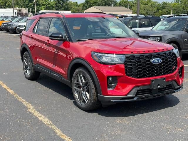 2026 Ford Explorer ST in Rapid Red Metallic Tinted Clearcoat — front three-quarter view